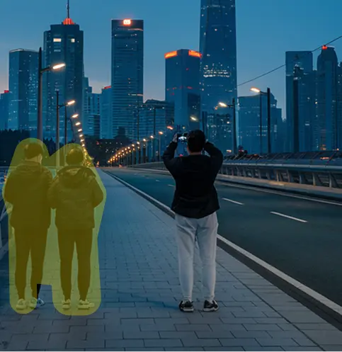 A pixelated image of an orange and white cat lying down, looking to the side, with blurred greenery in the background